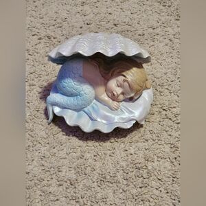 Porcelain Baby Mermaid in Shell Decor